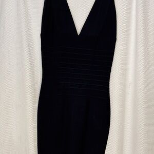 Your fave classic black Herve lever black evening dress